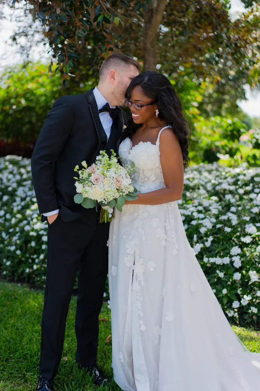 Bride and groom portrait in the garden